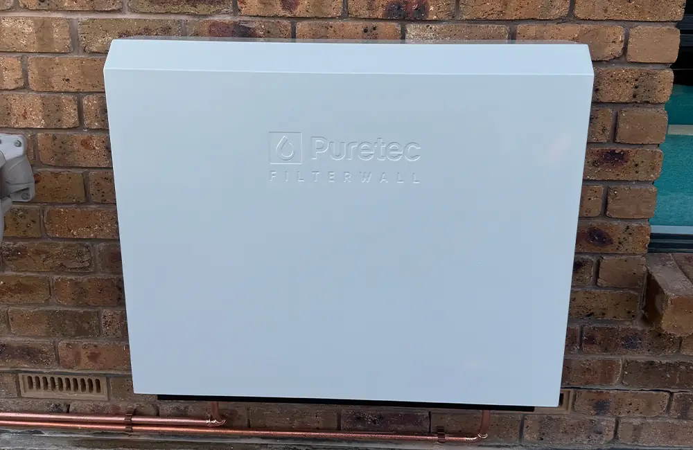FilterWall mounted on a brick wall