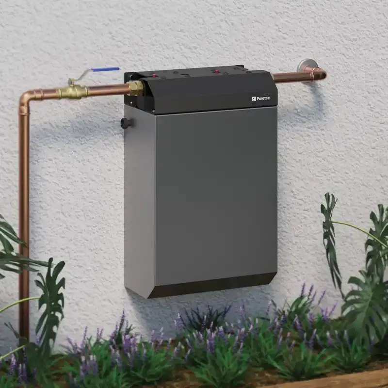 WH2-55AMC with its aluminium cover on a rendered wall